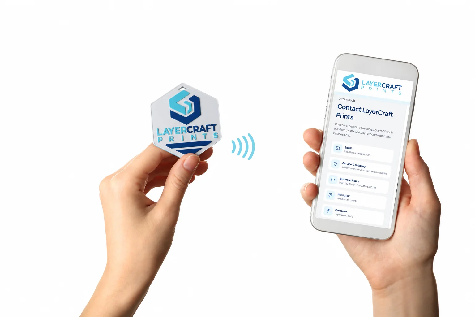 LayerCraft Prints NFC keychain held beside a smartphone